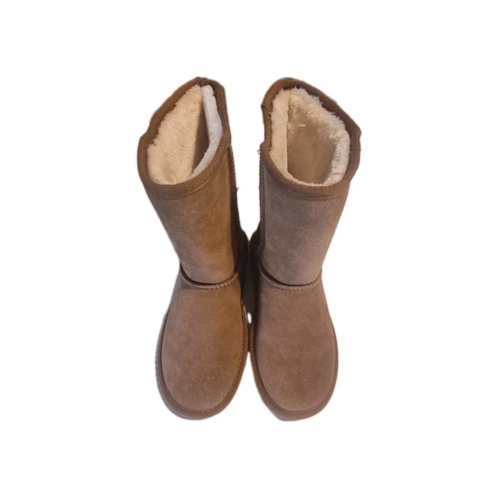 Minnetonka Olympia Short Sheepskin Leather Boots | Women's 6m